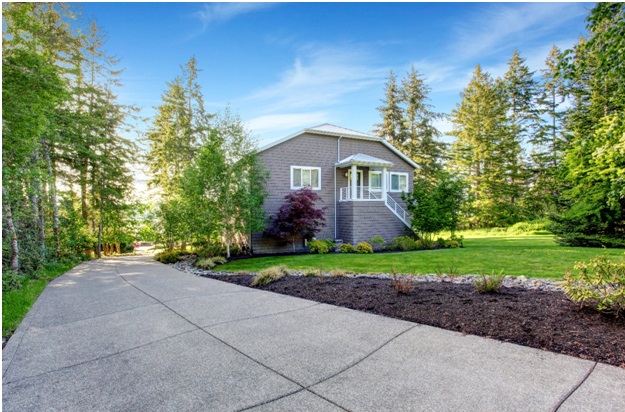 Luxury grey house concrete driveway design