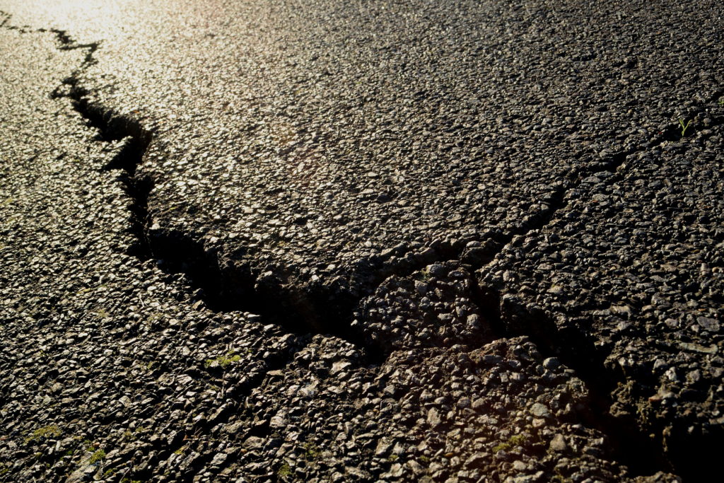 how to repair cracks in asphalt driveway