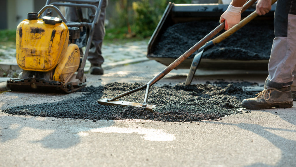 low angle view, workers asphalt concrete