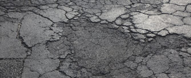 picture of pavement cracked and weathered